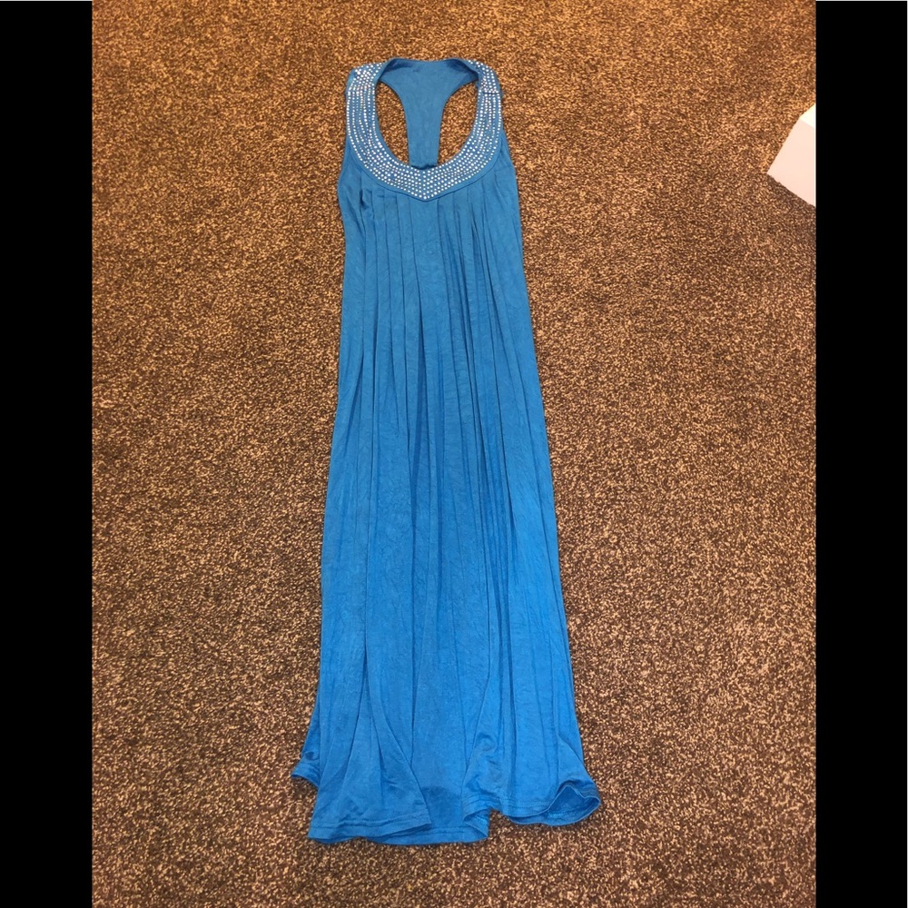Open back blue dress.
